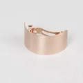 Detailed close-up of rose gold matte metal barrette with a smooth curved surface finish - Wide Version / Rose Gold