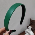 Detailed view of dark green leather headband with premium lychee grain and wide design - Dark Green