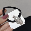 Elegante elastico per capelli nero con grande perla e decorazione a corona di strass - Angelo di Diamante