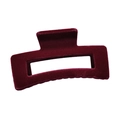 Macro detail of a large burgundy velvet hair claw clip with geometric hollow design - Dark Red