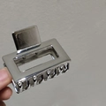 Sleek silver metal rectangular hair claw clip with hollow design for women - Silver