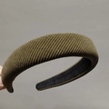 Detail view of the olive green padded headband showing textured vertical ribbed fabric - Olive Brown