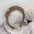 Detailed close-up of handmade pleated khaki satin headband with refined fabric texture - Khaki