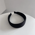 Minimalist wide black fabric headband with fine texture on a white surface - Black