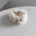 Detail of off-white seersucker hair scrunchie with sparkling silver rhinestone accents - Beige