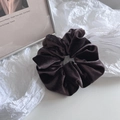 Close-up of a large velvet scrunchie in dark coffee brown with premium soft texture - Dark Purple