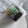 Set of 9 gradient TPU spiral hair ties in green and black colors within a clear bow-themed box - Malachite green