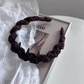 Detail view of purple polka dot headband with black plastic non-slip teeth comb - Burgundy