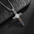 Macro shot of silver cross pendant with rainbow zircons and St. Benedict medal on box chain - Silver