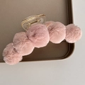 Detailed view of pink plush hair claw clip with faux rabbit fur balls and acrylic base - Snow Bud Pink