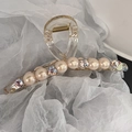 Detalle de pinza para el pelo con perlas crema y cristales de color lavanda - Rosa