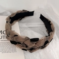 Detail of khaki mesh braided headband with black flocking polka dots and inner lining - Brown