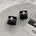 Macro di mini fermagli per capelli neri con fiocchi in metallo argento e perle bianche - Stile Fiocco
