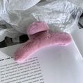 Detail view of large mauve faux fur hair claw clip with soft texture for winter updo - Rose Pink