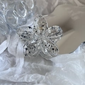 Chic frangipani hair claw clip with black ink splatter pattern on a modern white background - White + Grey