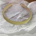 Detail of light green woven fabric headband with a non-slip inner lining texture - Yellow & Green