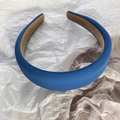 Detailed view of thick padded sponge headband with premium blue fabric and velvet lining - Klein Blue