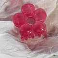 Detail view of a translucent rose red flower hair claw clip on a white background - Rose Pink