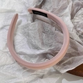 Close-up of pink sponge headband fabric texture with handmade label detail - Light Pink