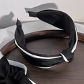 Detail of vintage black and white contrast headband with elegant satin knot decoration - Knotted Wide Headband / Black and White Patchwork