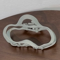 Matte sage green large cloud hair claw clip with cutout design on wood surface - Gray