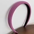 Detail view of purple padded sponge headband with textured fabric and black lining - Rose Red