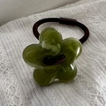 Elastico per capelli con fiore in resina verde e trama marmorea su pizzo - Verde