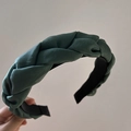 Detail of dark green woven headband with thick braid texture and silky fabric finish - Dark Green