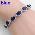 Fashionable silver bracelet with blue pear-shaped gemstones and zircon inlay - Blue