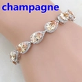 Close-up of champagne pear-cut gemstone bracelet with micro-pave setting on wrist - Champagne