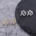 Hip hop XO stud earrings in gold and silver finish with sparkling cubic zirconia stones - Silver