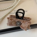 Dettaglio del fermaglio per capelli in tweed con cristallo e montatura in metallo retrò - Marrone Rosa Artiglio per Capelli