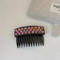 Vista dettagliata del pettine per capelli con strass rosa e grigi brillanti e design multi-dente - Pettine Capelli Cristallo Sfumato