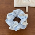 Detail of blue plaid and floral pattern scrunchie on vintage wood background - Hair Tie / Blue Checkered Double Layer