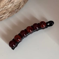 Close-up of vintage leopard-pattern banana clip with smooth reddish amber beads - Large Beads / Dark Tortoise Amber (Large Beads)