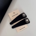 Detail of black velvet teardrop hair clips with oval crystals and rhinestone pavé border - Rhinestone Velvet Hair Clips - Black