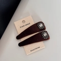Detail of dark brown velvet hair clips featuring octagonal crystal and black rhinestones - Rhinestone Velvet Hair Clips - Coffee