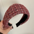 Detail of red and white tweed headband with colorful threads and black inner lining - Red Grey