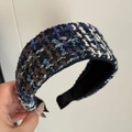 Close-up of thick blue and white tweed knit texture on wide padded headband - Blue Coffee Beige