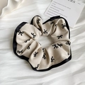Beige scrunchie with black bow print and satin piping edge, elegant hair tie - Off White 0687