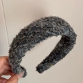 Close-up of wide thick dark grey plush headband with subtle colorful knit sequins - Blue Grey