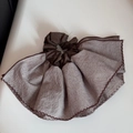 Macro shot of striped coffee and white ruffled fabric scrunchie with detailed stitching - Fine Striped Skirt Edge - Coffee