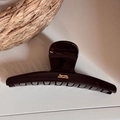 Close-up of dark brown hair claw clip with golden Barrette La France lettering details - Hanger Shape (Patch Letter Gold Label) / Brown