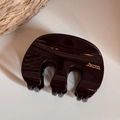 Close-up of burgundy high-gloss shark clip with gold Barrette La France lettering - M-Shape (Patch Letter Gold Label) / Brown
