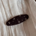 Detail of wool felt oval hair clip with creamy white bow embroidery and polka dots - Coffee Oval