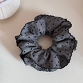 Detailed view of gray polka dot scrunchie with elegant black scalloped edge texture - Pleated Polka Dot / Gray