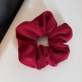 Close-up of a burgundy ruffled velvet scrunchie showing plush matte fabric texture - Scrunchie / Solid Red