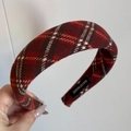 Detail of red plaid wool headband showing handmade woven label and thick fabric texture - Padded Headband / Dark Red Plaid