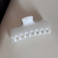 Close-up of white marble pattern shark hair clip made of premium acetate fiber material - Large White