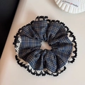 Detailed close-up of blue plaid scrunchie with layered lace edges and retro design - Navy Blue Plaid - Lace Edge
